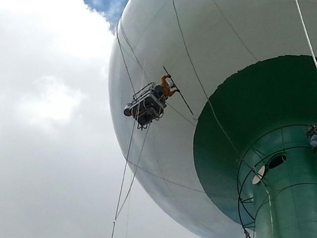 painti golf ball graphic water tower